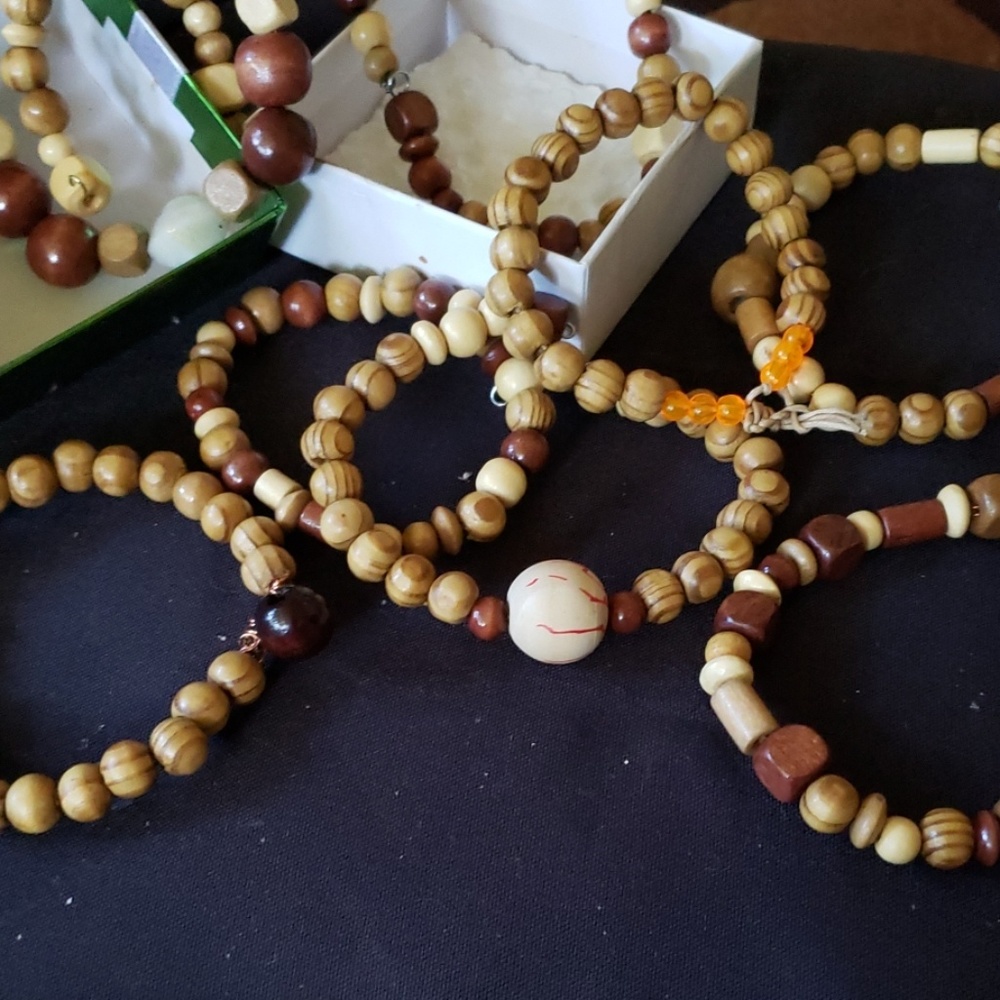 Wooden bead bracelets .